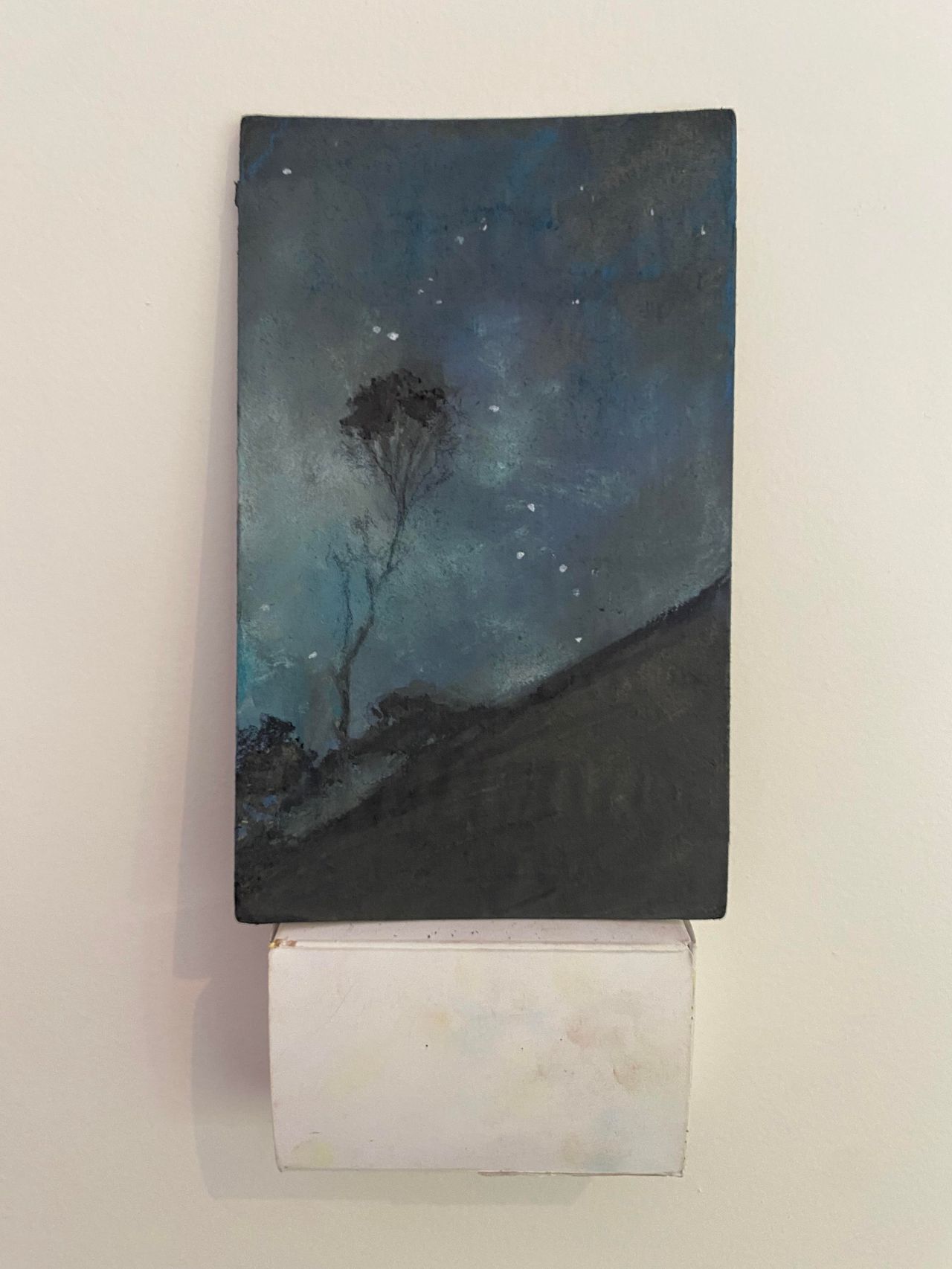 Exhibitions---ReniereDepla-Australian-Darkness-Visible-2023.-Mixed-media-on-cardboard-10x17cm..jpg