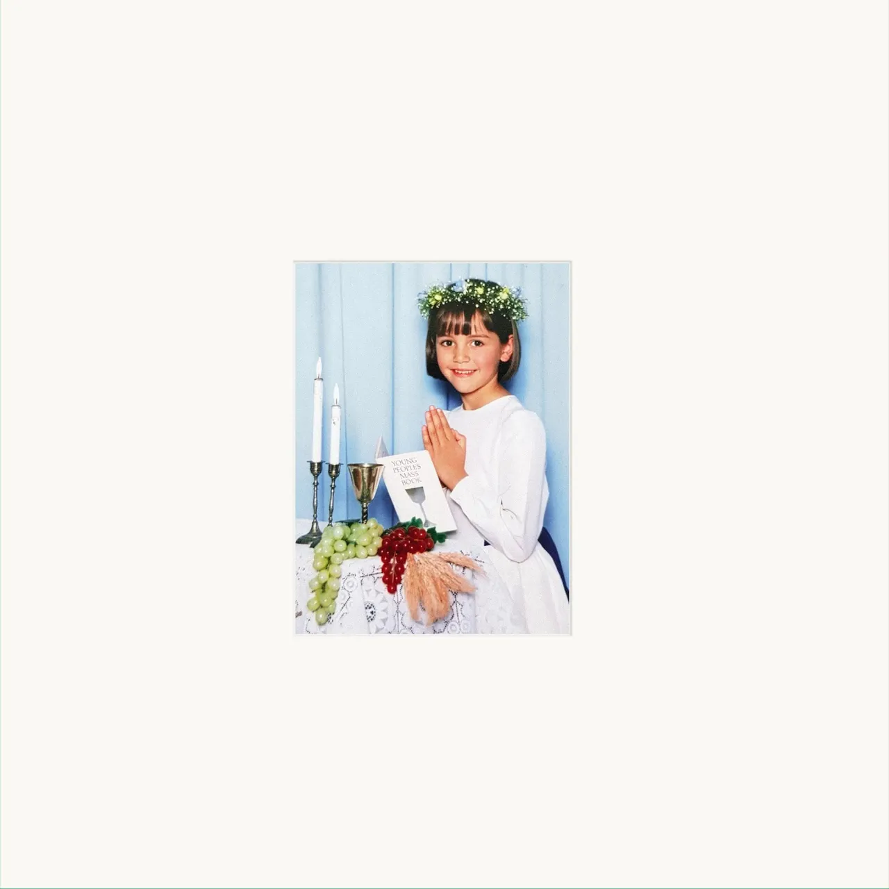 Logic1000 All In For You album cover art featuring a central childhood photo of a girl in a white communion dress praying by a table