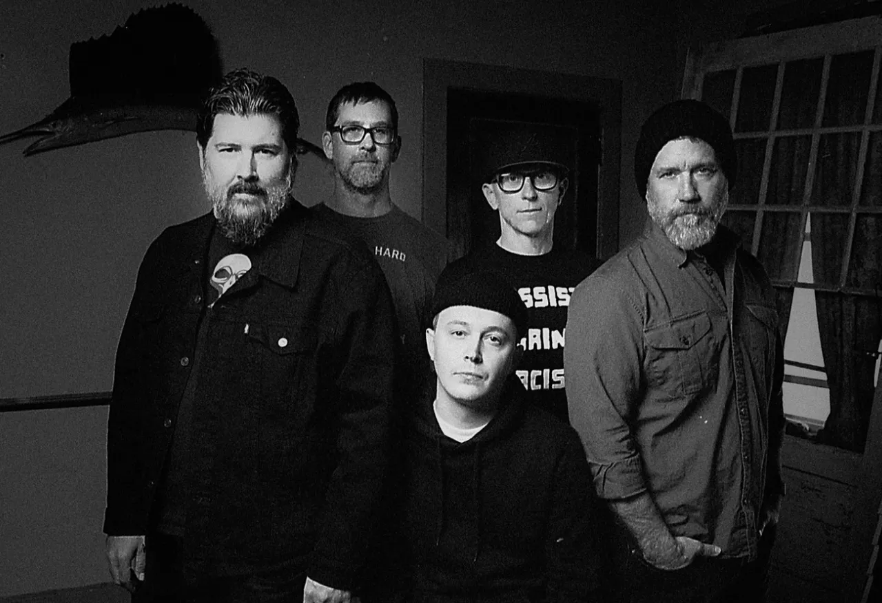 Image via @hotwatermusic (Facebook)